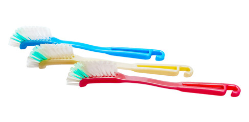 Colour dishwashing brushes with white background