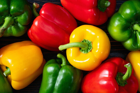 Fresh sweet bell pepper ( paprika ) photography red , green and yellow . Colorful vegetable . Top view