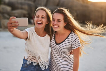 Selfie, friends or happy on beach for travel, holiday or making memories at reunion. Women, vacation or smile for photography with wind, hug or excited at ocean for relationship development in Miami