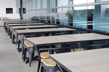 Close up of dining table and chair with defocused environment. Eating environment. 