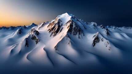 Majestic Mountain Peaks:  A solitary, snow-capped mountain peak stands tall against a dramatic, twilight sky, its silhouette bathed in a warm, golden light. This breathtaking landscape image evokes 