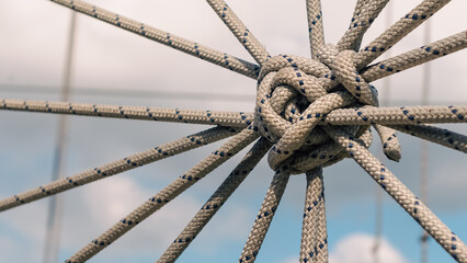 many ropes and one big knot close up