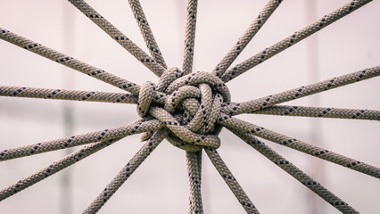 many ropes and one big knot close up