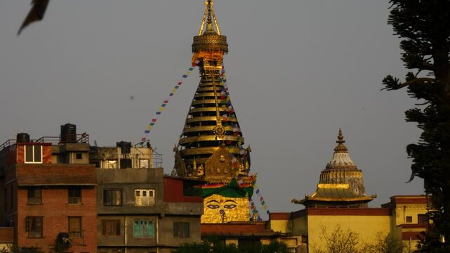 Swayambhunath Stupa is a UNESCO world heritage site and a Buddhist temple and pilgrimage also known as monkey temple. Buddha's eye or wisdom eye looking over valley.
