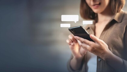 Person using a messaging app on a smartphone, representing communication, digital messaging, and connectivity.