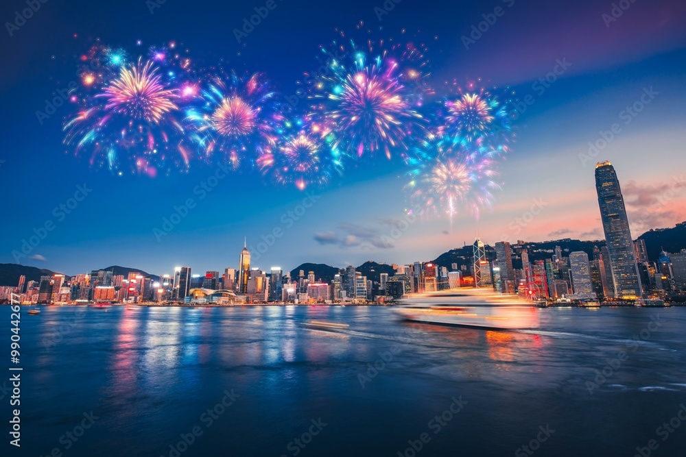 Poster Fireworks explode over a Hong Kong cityscape at twilight, reflecting in the water.