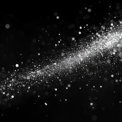 Obraz premium Abstract white bokeh lights scattered across a black background.