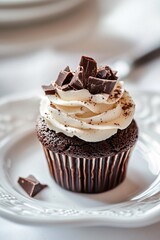 Chocolate cupcake on a white plate