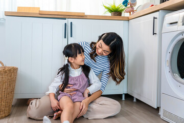 Asian happy family, mother spend free time with kid together at home. 