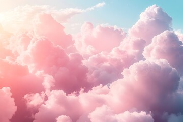 Fototapeta premium Vibrant Pink Clouds Floating in a Clear Blue Sky at Dusk
