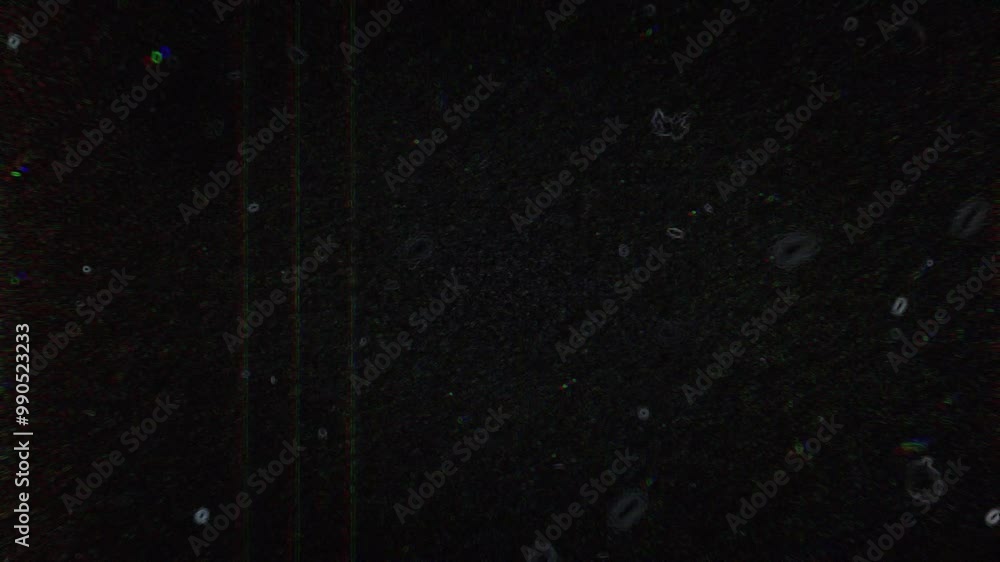 Poster blob shaped particles floating and flowing on a black background with light chromatic aberration eff