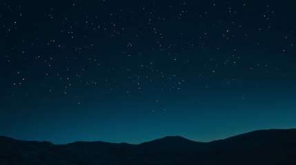 Starry night sky with a gradient of deep blue hues and sparkling stars, creating a mesmerizing scene that evokes feelings of wonder and mystery