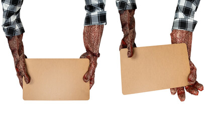 Two monster hands holding a piece of brown paper. A blank piece of brown paper for copy space....