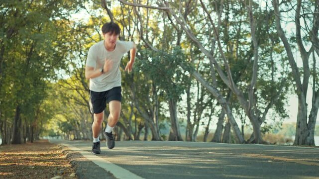 Runner asian man took a moment to rest from exhaustion before continuing to run, Fitness Man Running, Training Run Workout