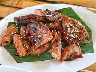 Grilled pork intestines. Grilled intestines, Roasted pork Chitterlings (Sai On Yang) with spicy sauce. Traditional and local Thai food.