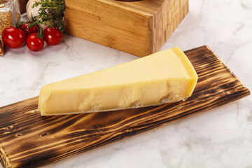 Hard parmesan cheese piece triangle