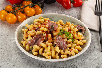 Italian pasta cellentani with anchovy