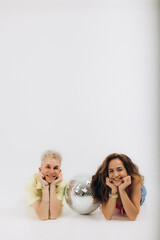 a dancing couple on a white background with a disco ball