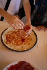 a workshop for children on cooking pizza in an old wood-fired oven