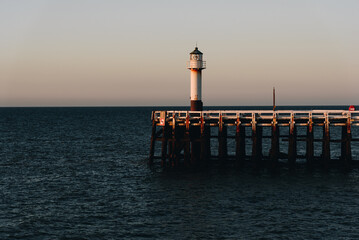 Nieuwpoort pier and lighthouse at sunset