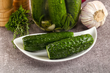 Homemade lighty salted cucumbers with herbs