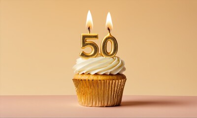 Golden cupcake with lit candles, number 50
