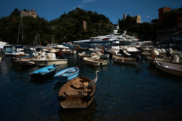 streets, bays and yachts on the charming coast of Portofino in northern Italy on a summer day
