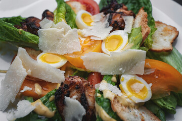 Caesar salad close-up on a plate