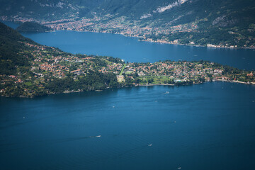 Lake Como with charming yachts surrounded by hills