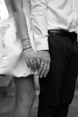 close up of a couple holding hands