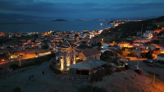 Old historical windmill made of stone located on Cunda Island in Ayvalık district of Balıkesir Province of Turkey