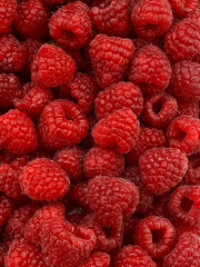 Close up of raspberries, from above filling the frame