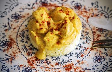 Succulent chicken curry dish with rice
