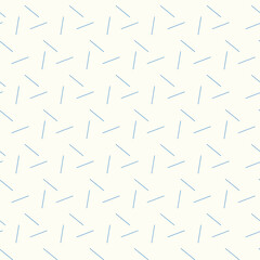 fun, retro, blue dashes on cream background seamless pattern