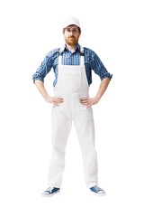 Confident house painter posing with work tools © StockPhotoPro