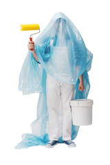 Happy house painter covered with a dust sheet
