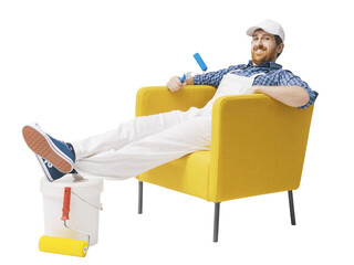 House painter relaxing on a yellow armchair © StockPhotoPro