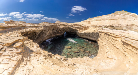 Breathtaking panorama of the natural Grotte de Saint-Antoine cave in Corsica. Golden rock...