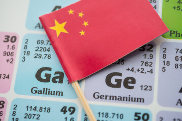 Ge (Germanium) Ga (Gallium) in the periodic table with Chinese flag. US vs China chip war or tech war, microchip semiconductor industry concept. China curbs on exports of rare germanium and gallium.