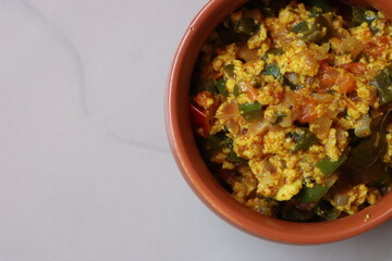 Paneer Bhurji or paneer burji, cottage cheesse fry with onion, tomato, capsicum and spices