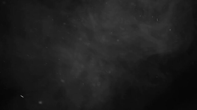 footage of flying dust smoke black background