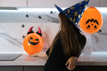 Halloween at home. Kids are ready for Trick or Treat. Portrait of child in suit, ready for holiday...