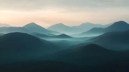 Soft morning mist gently rising over the majestic snow capped mountain peaks at the first light of dawn creating a serene and ethereal landscape