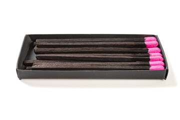 angle view pink matchbox on a white background