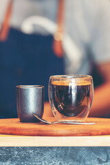 Vertical Close up hands of woman sitting office desk holding sweet coffee cup relax and enjoy with happy time. Vertical Horizon Hot coffee mug in hand. Woman hand holding coffee cup relax at office