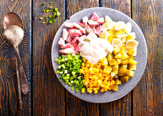 A fresh crab salad, with crabs claw and crab crackers.
