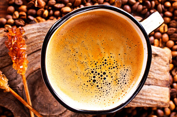 Coffee cup and coffee beans on gray background