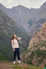 woman looking at the mountains