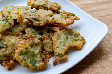 Golden Crispy Goodness, Capturing the Top View of Vegetable Fritter.