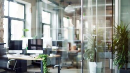 A bright and airy office space adorned with indoor plants and modern furnishings, encouraging a fresh and lively working environment.